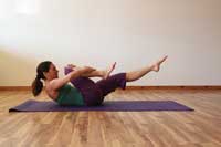 Jenna Woodbury practicing Pilates.