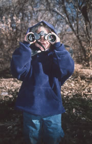 Child with binoculars